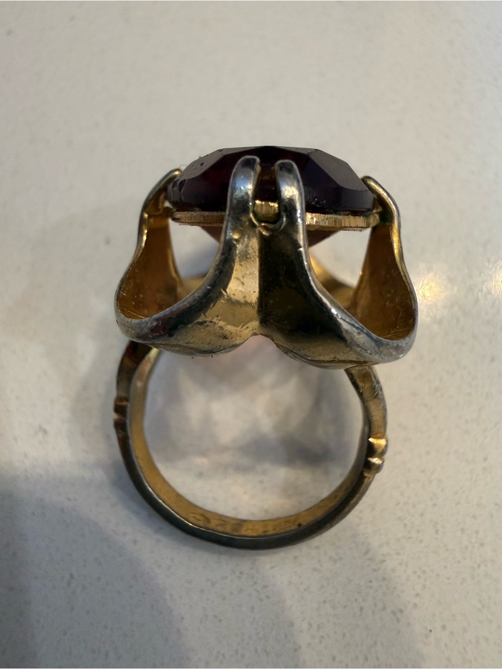 Gold-Tone Ring with Deep Purple Faceted Stone